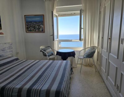 Room with views of the sea and the beach