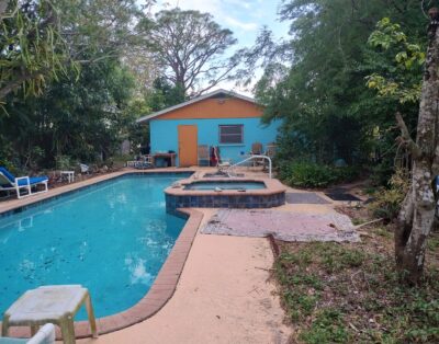 Unique 1-bedroom with AC in Bonita Springs FL. Htd pool, Fruit trees, Oak Creek. Bamboo stand, large ficus tree.